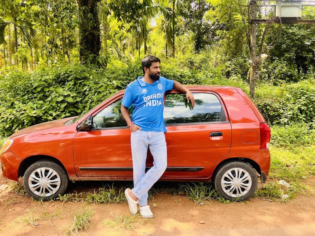 On a forest roadside beside the Alto.